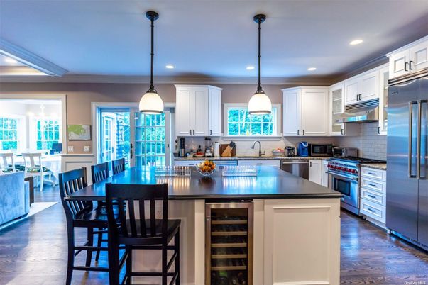 Dining room, Interior, Kitchen, Pendant Lights, Recessed Lighting, Stainless Steel Appliances, Wood Texture Flooring