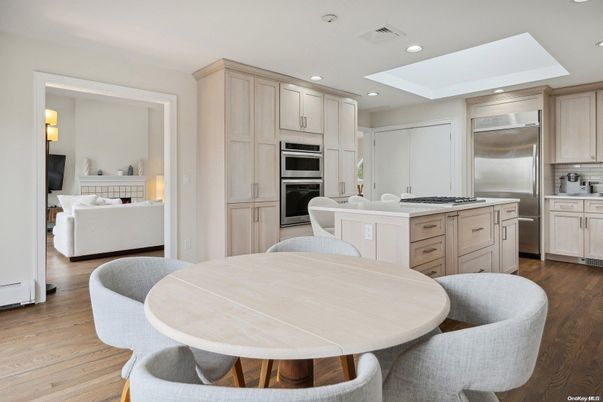 Dining room, Interior, Kitchen, Living room, Recessed Lighting, Stainless Steel Appliances, Wood Texture Flooring