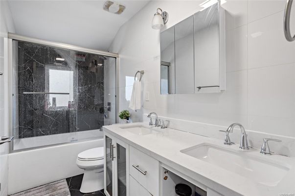 Bathroom, Dual Sink Vanities, Glass Shower, Interior, Wood Texture Flooring