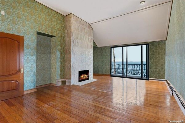 Empty room, Fireplace, Interior, Recessed Lighting, Water, Wood Texture Flooring