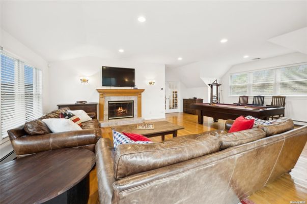 Billiard Table, Fireplace, Game Room, Interior, Living room, Recessed Lighting, Wood Texture Flooring