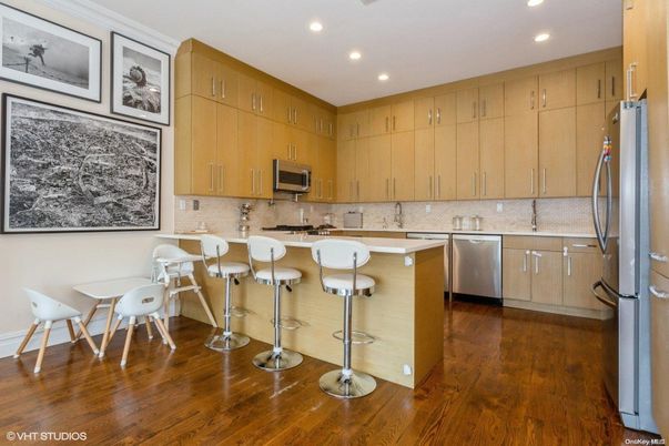 Dining room, Interior, Kitchen, Recessed Lighting, Stainless Steel Appliances, Wood Texture Flooring
