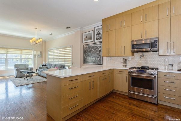 Chandelier, Interior, Kitchen, Living room, Recessed Lighting, Stainless Steel Appliances, Wood Texture Flooring