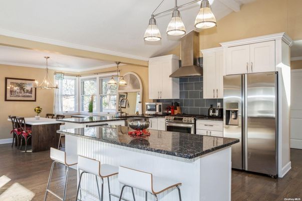Chandelier, Dining room, Interior, Kitchen, Pendant Lights, Stainless Steel Appliances, Wood Texture Flooring