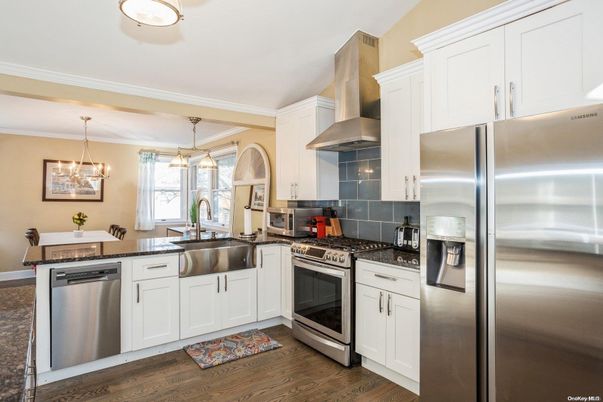 Dining room, Interior, Kitchen, Pendant Lights, Stainless Steel Appliances, Wood Texture Flooring