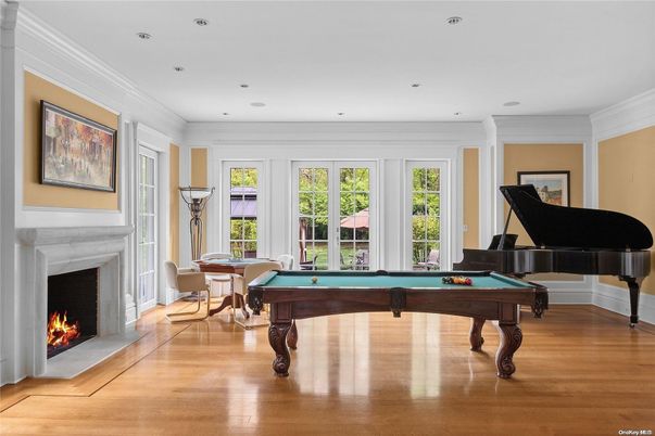 Billiard Table, Fireplace, Game Room, Interior, Piano, Recessed Lighting, Wood Texture Flooring