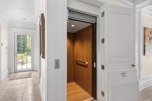 Elevator, Interior, Recessed Lighting, Wood Texture Flooring, Wooden Walls