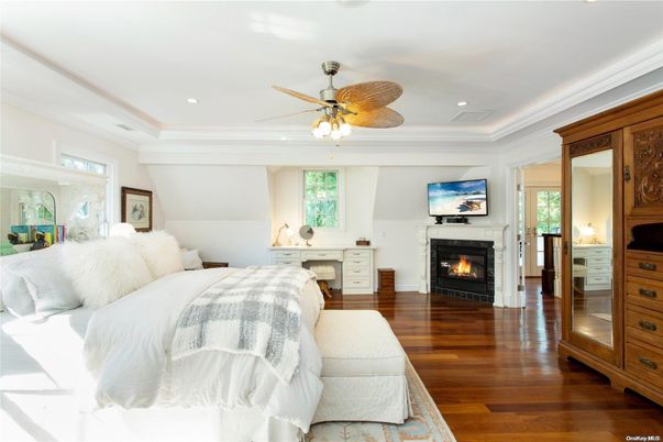 Bedroom, Fireplace, Interior, Recessed Lighting, Wood Texture Flooring