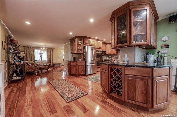 Chandelier, Dining room, Interior, Kitchen, Living room, Recessed Lighting, Stainless Steel Appliances, Wood Texture Flooring