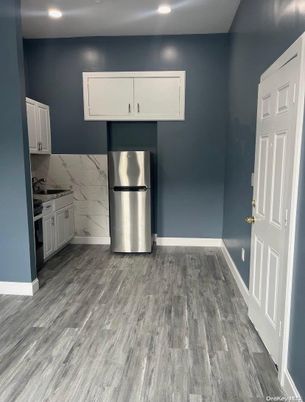 Interior, Kitchen, Marble Walls, Recessed Lighting, Wood Texture Flooring