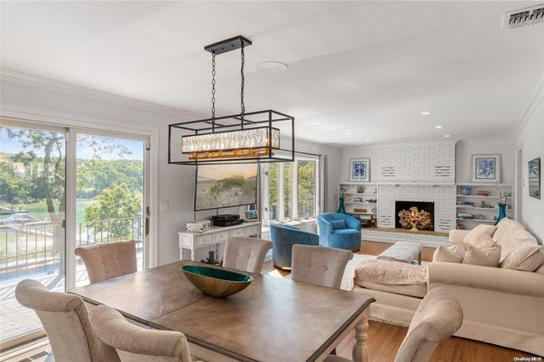 Dining room, Fireplace, Interior, Living room, Pendant Lights, Recessed Lighting, Stone Walls, Wood Texture Flooring