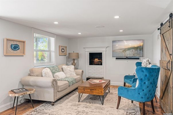 Fireplace, Interior, Living room, Recessed Lighting, Wood Texture Flooring