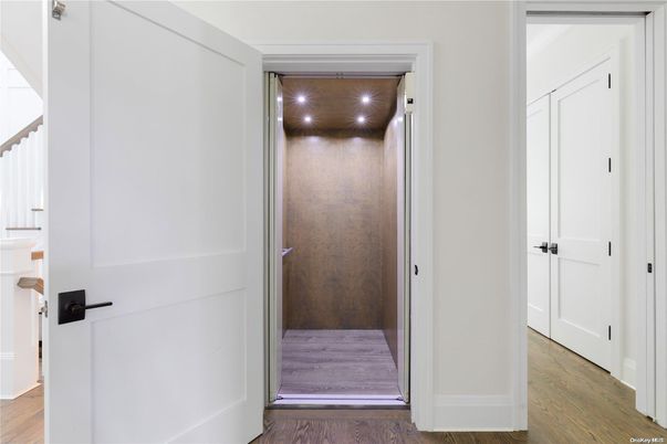 Elevator, Interior, Recessed Lighting, Wooden Ceilings, Wood Texture Flooring, Wooden Walls
