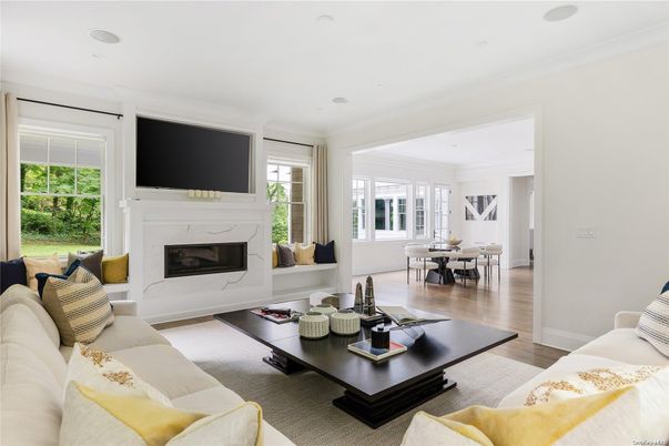 Dining room, Fireplace, Interior, Living room, Recessed Lighting, Wood Texture Flooring