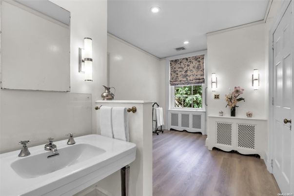 Bathroom, Dual Sink Vanities, Interior, Recessed Lighting, Wood Texture Flooring