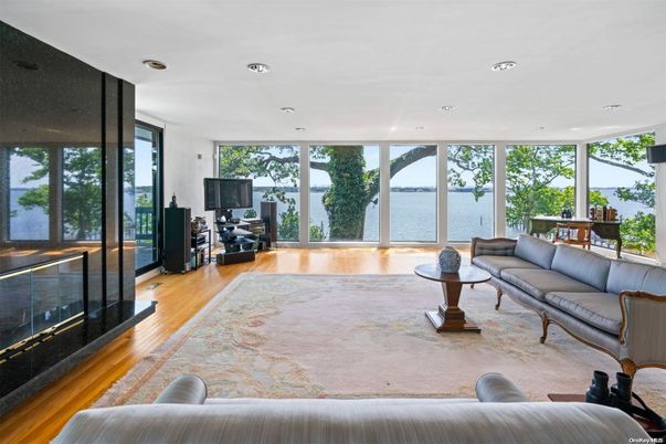 Fireplace, Interior, Living room, Recessed Lighting, Water, Wood Texture Flooring