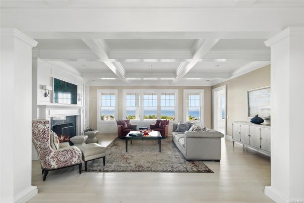 Fireplace, Interior, Living room, Recessed Lighting, Water, Wood Texture Flooring