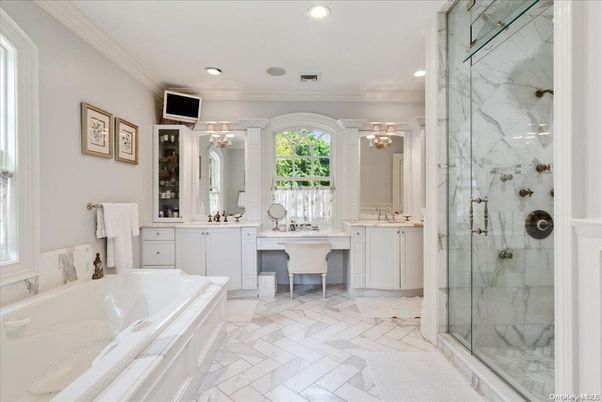 Bathroom, Chandelier, Dual Sink Vanities, Glass Shower, Interior, Marble Walls, Recessed Lighting