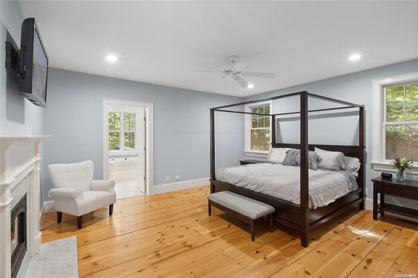 Bedroom, Fireplace, Interior, Recessed Lighting, Wood Texture Flooring