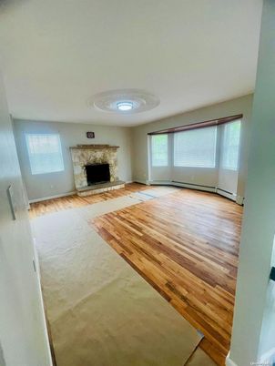 Empty room, Fireplace, Interior, Recessed Lighting, Wood Texture Flooring