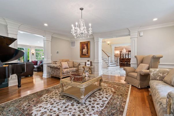 Chandelier, Interior, Living room, Piano, Recessed Lighting, Wood Texture Flooring