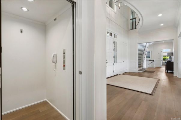 Elevator, Interior, Recessed Lighting, Wood Texture Flooring
