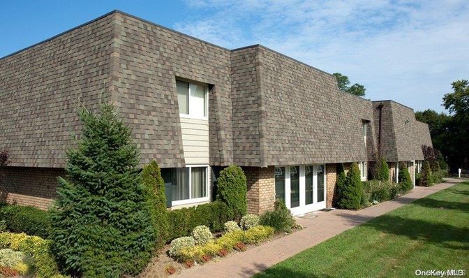 Exterior, Facade, Brick Facade, Condo Building