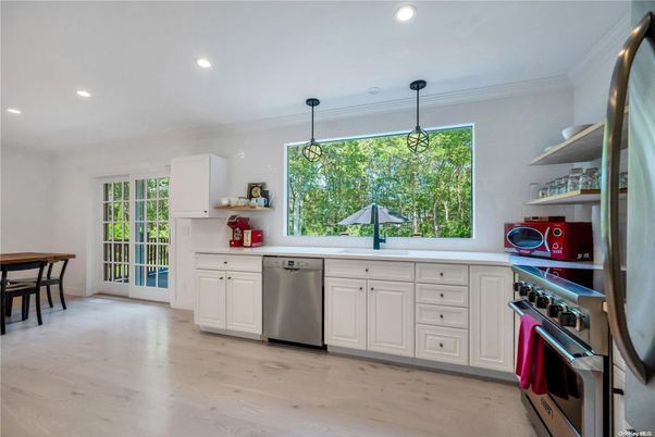 Dining room, Interior, Kitchen, Pendant Lights, Recessed Lighting, Stainless Steel Appliances, Wood Texture Flooring