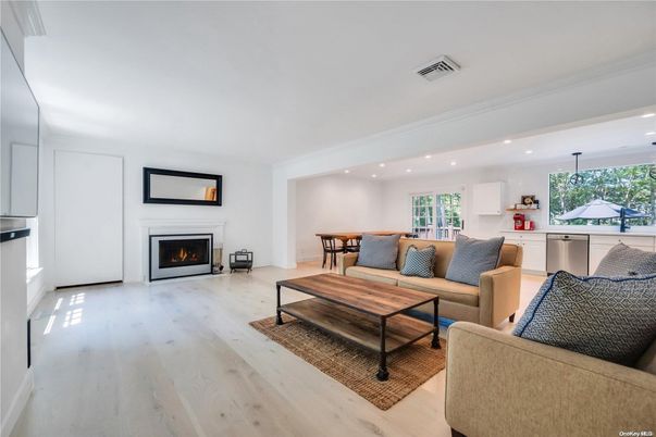 Dining room, Fireplace, Interior, Kitchen, Living room, Recessed Lighting, Wood Texture Flooring