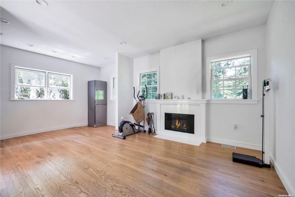 Empty room, Fireplace, Interior, Recessed Lighting, Wood Texture Flooring