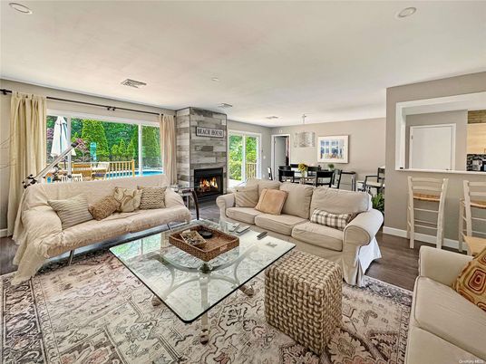 Dining room, Fireplace, Interior, Living room, Pendant Lights, Recessed Lighting, Wood Texture Flooring