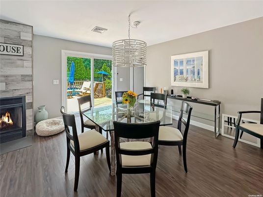 Dining room, Fireplace, Interior, Pendant Lights, Wood Texture Flooring
