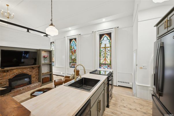 Fireplace, Interior, Kitchen, Pendant Lights, Recessed Lighting, Stone Walls, Wood Texture Flooring