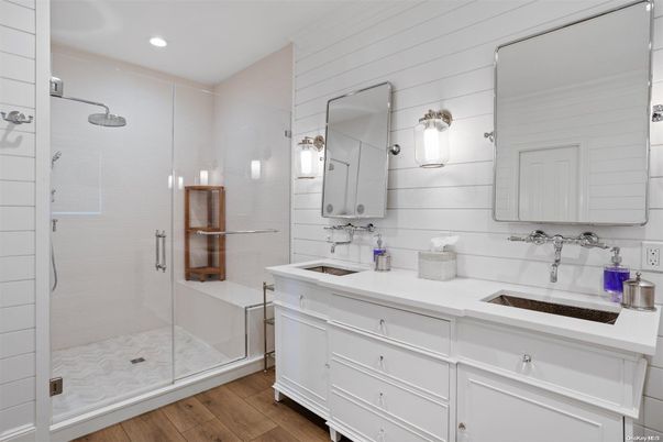 Bathroom, Dual Sink Vanities, Glass Shower, Interior, Recessed Lighting, Wood Texture Flooring