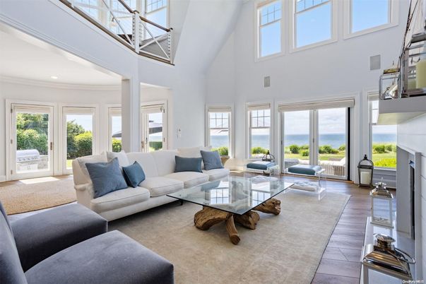 Fireplace, Interior, Living room, Recessed Lighting, Water, Wood Texture Flooring