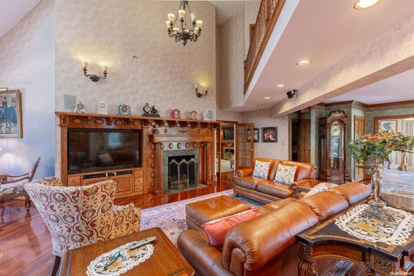 Chandelier, Fireplace, Interior, Living room, Recessed Lighting, Wood Texture Flooring
