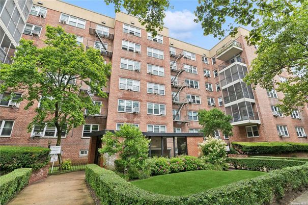 Exterior, Facade, Brick Facade, Condo Building