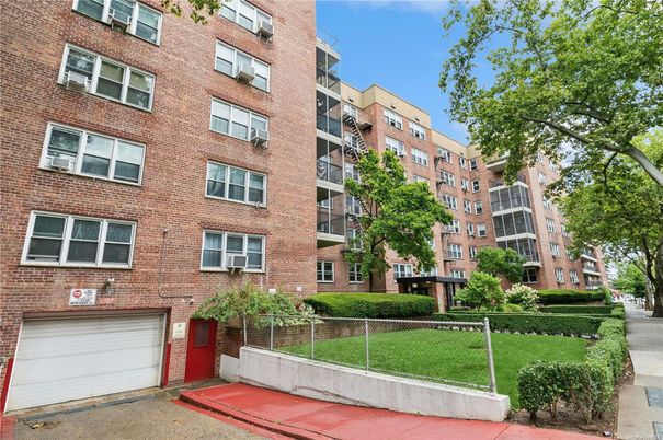 Attached, Exterior, Facade, Brick Facade, Condo Building