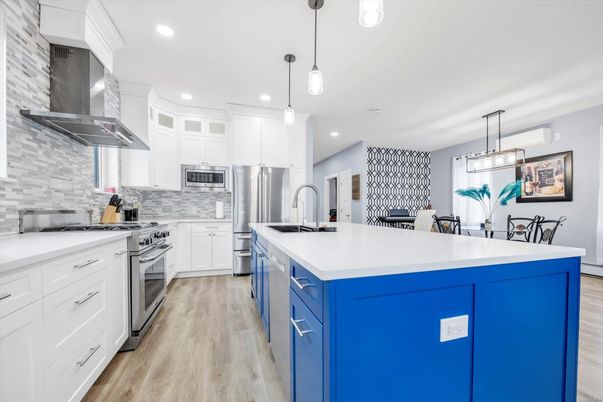 Dining room, Interior, Kitchen, Pendant Lights, Recessed Lighting, Stainless Steel Appliances, Wood Texture Flooring