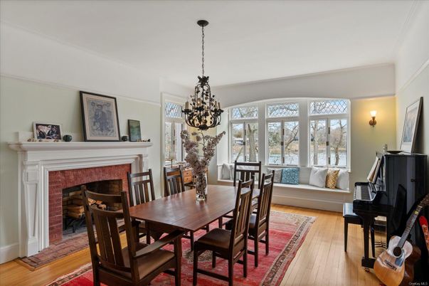 Chandelier, Dining room, Fireplace, Interior, Pendant Lights, Piano, Wood Texture Flooring