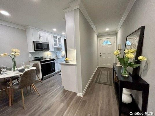 Dining room, Interior, Kitchen, Recessed Lighting, Stainless Steel Appliances, Wood Texture Flooring