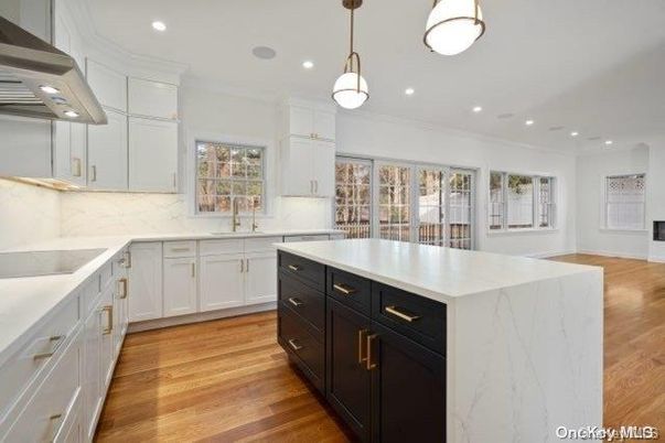 Interior, Kitchen, Marble Walls, Pendant Lights, Recessed Lighting, Wood Texture Flooring