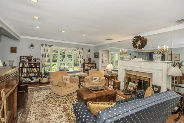 Chandelier, Fireplace, Interior, Living room, Recessed Lighting, Wood Texture Flooring
