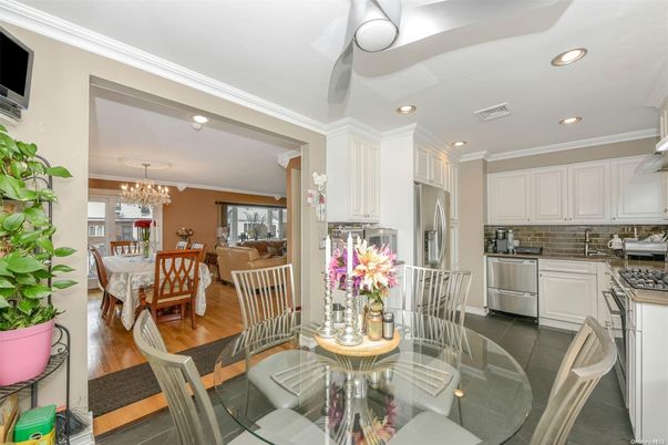 Chandelier, Dining room, Interior, Kitchen, Living room, Recessed Lighting, Stainless Steel Appliances, Wood Texture Flooring