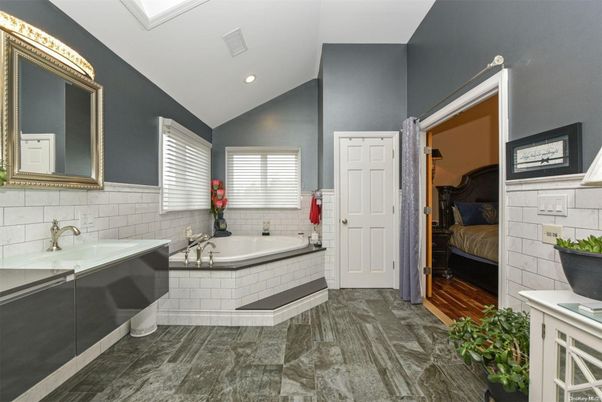 Bathroom, Bedroom, Dual Sink Vanities, Interior, Recessed Lighting, Wood Texture Flooring