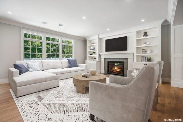 Fireplace, Interior, Living room, Recessed Lighting, Wood Texture Flooring