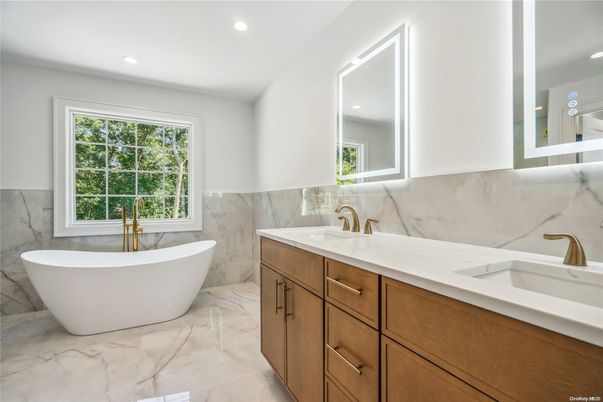 Bathroom, Dual Sink Vanities, Free Standing Baths, Interior, Marble, Marble Walls, Recessed Lighting