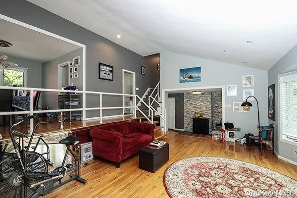 Fireplace, Interior, Recessed Lighting, Stone Walls, Wood Texture Flooring