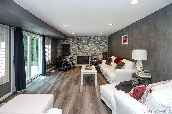 Interior, Living room, Recessed Lighting, Stone Walls, Wood Texture Flooring
