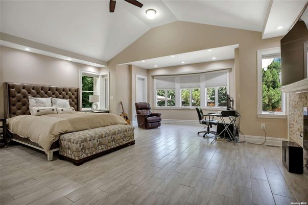 Bedroom, Fireplace, Interior, Recessed Lighting, Wood Texture Flooring